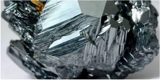 Raw hematite natural stone — shiny black metallic mineral from lava rock