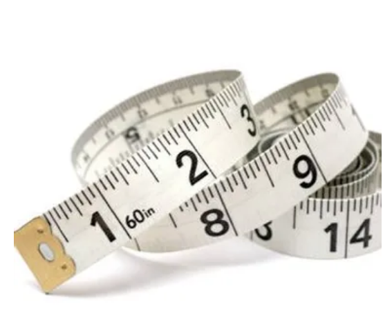 Flexible measuring tape coiled up for measuring wrist size